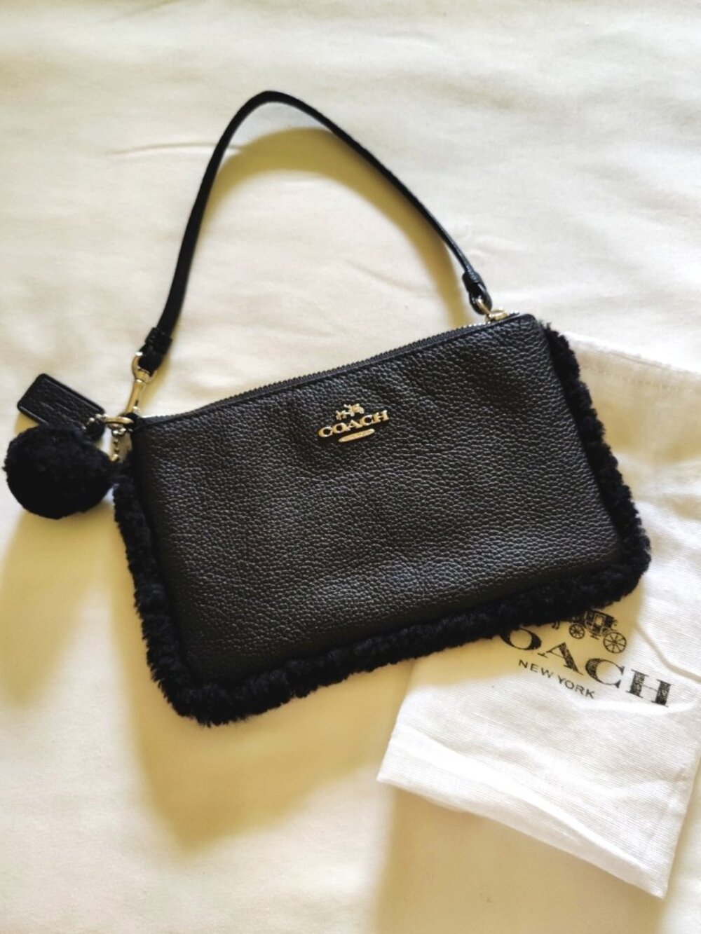 Coach Pebbled Leather & Shearling Pom Pom Large Wristlet in Black, EUC